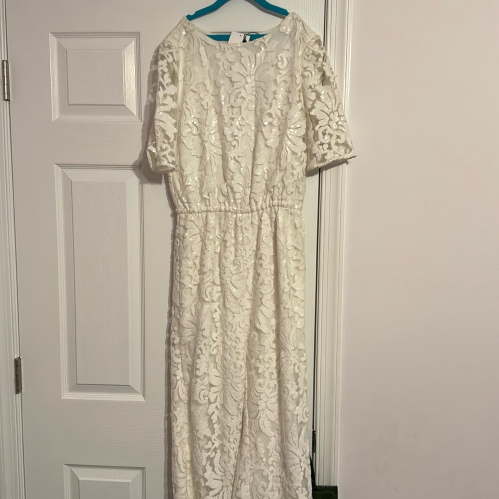Diana Von Furstenberg white sequin jumpsuit 

Brand new with tags! Size 6
